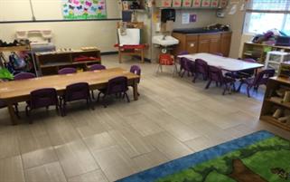 Preschool classroom activity center with learning materials